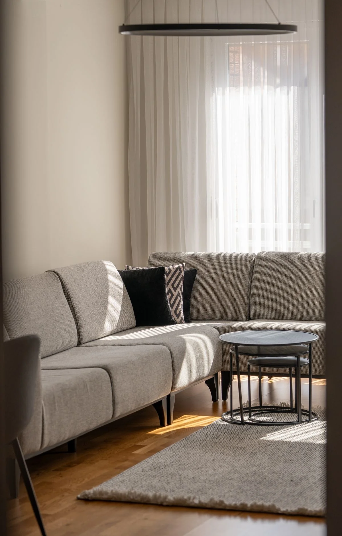Corner seating arrangement with sofa in a small living room