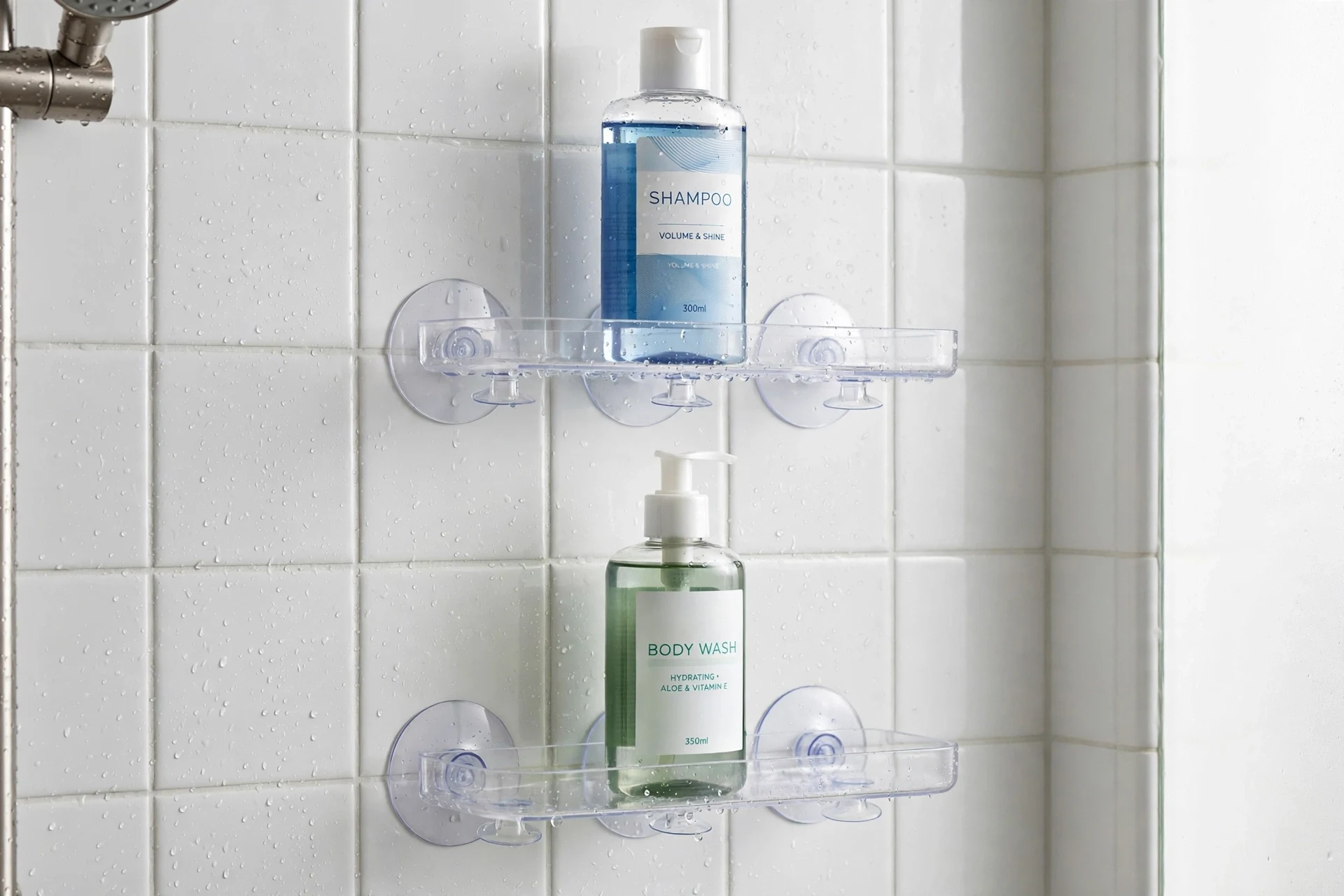 Suction cup shelf holding shower bottles on a tiled wall