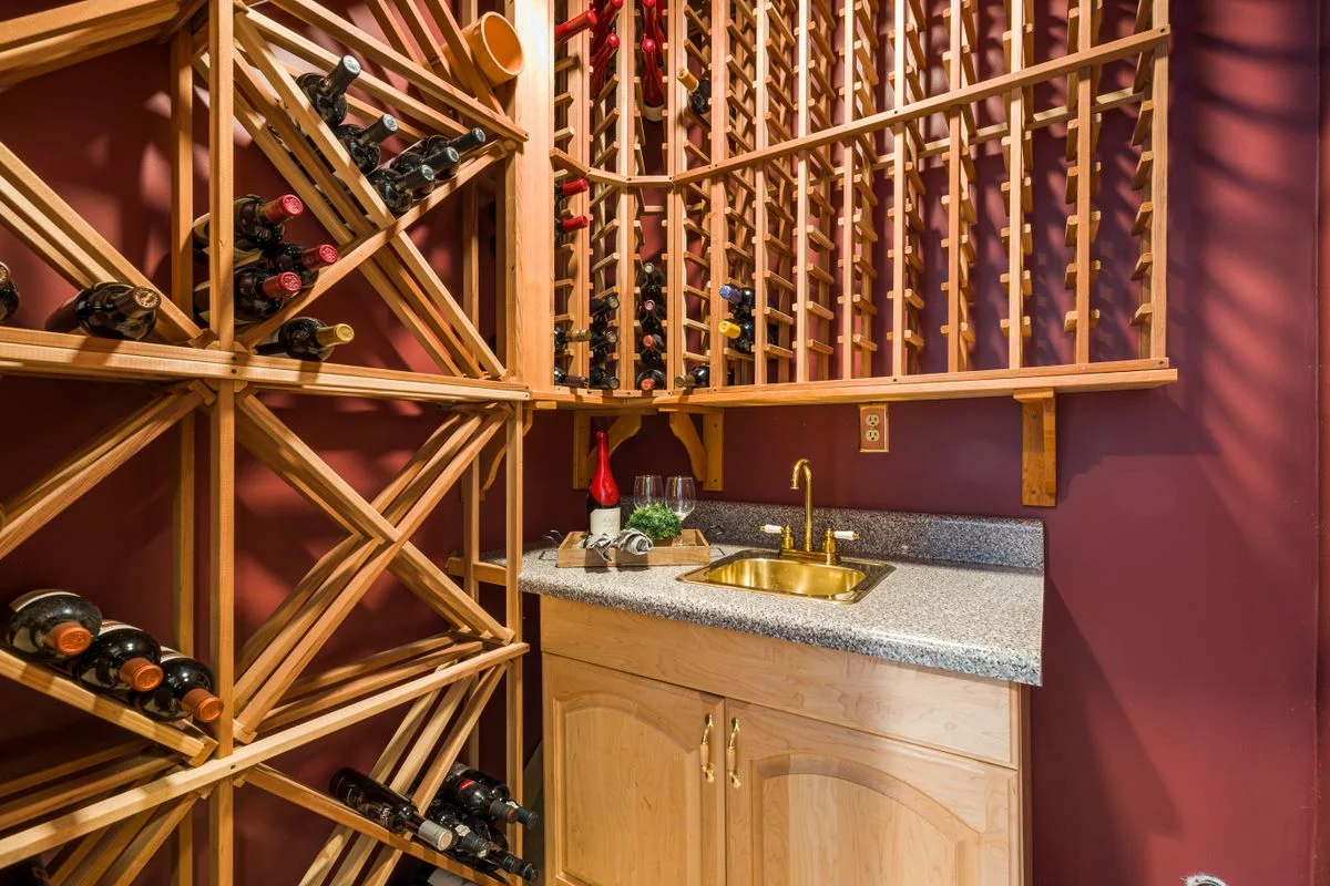 Wine rack storage built under a staircase