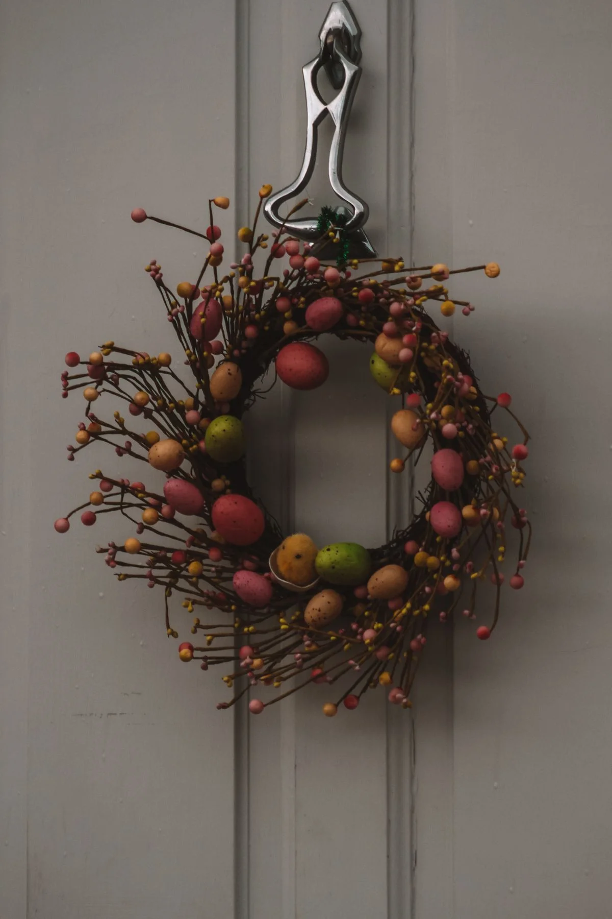 Spring wreath hanging on a living room wall