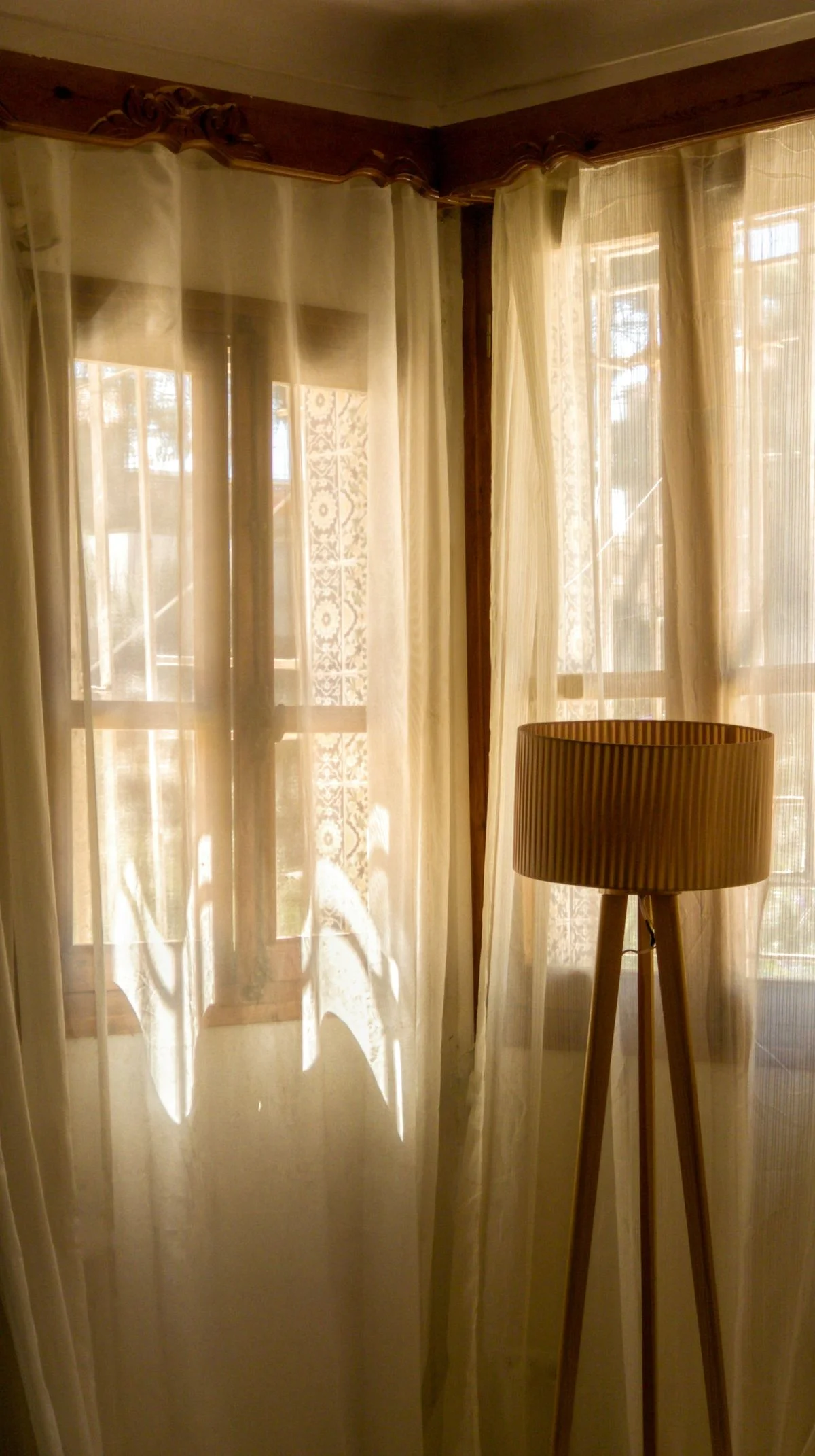Sheer linen curtains in a bright living room