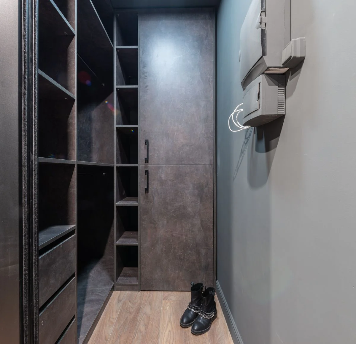 Under-stair shoe cabinets with tilted shoe shelves