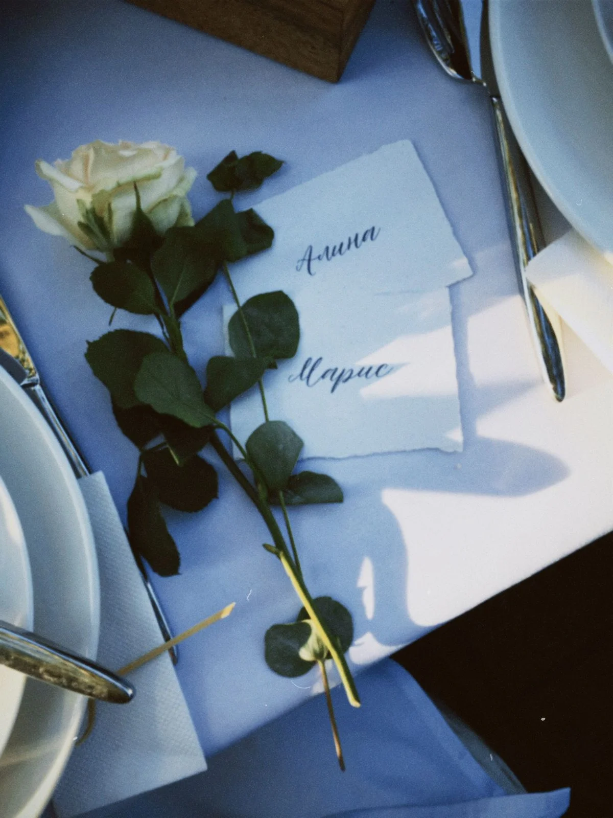 Personalized place cards at a garden party table