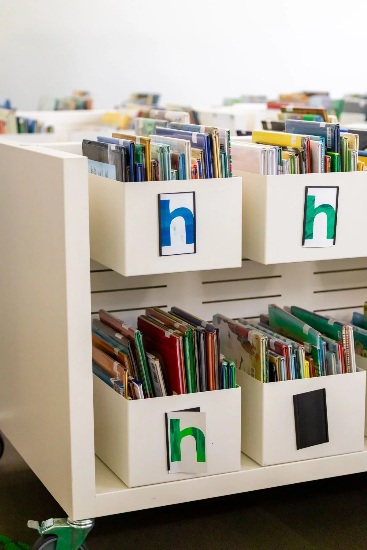 Rolling book cart for kids books