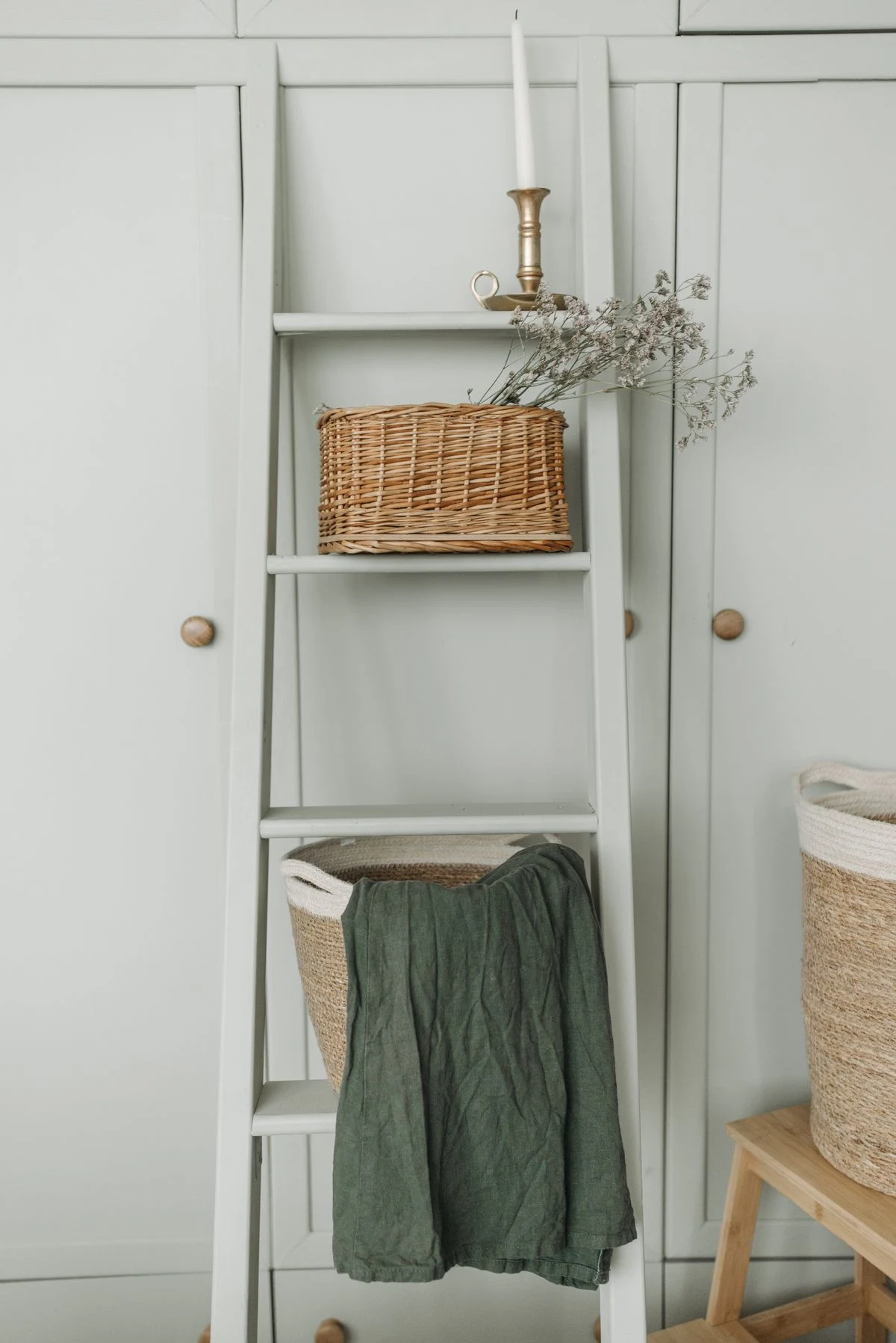 Ladder shelf with decor in a farmhouse living room