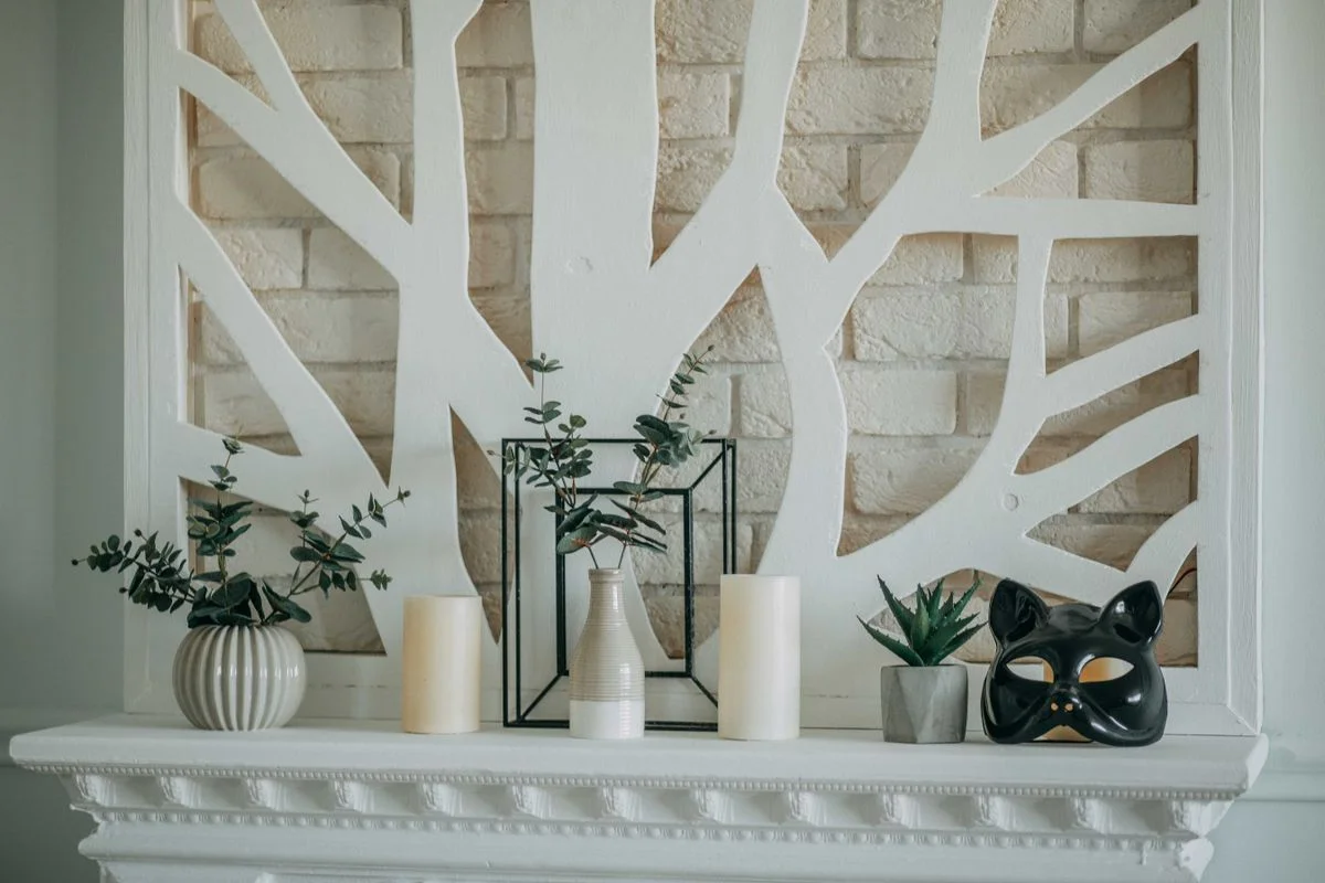 Decorated fireplace mantel in a traditional living room