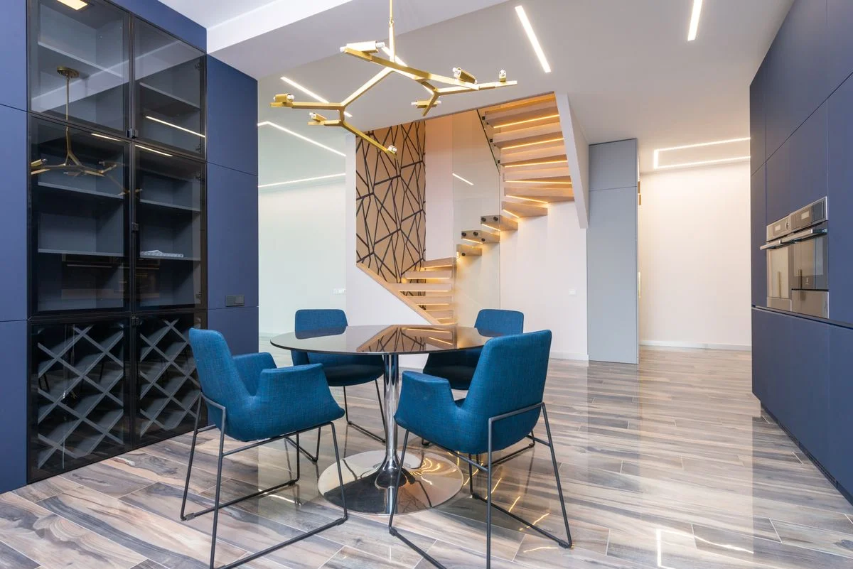 Under-stair wine cabinets with racks and glass doors