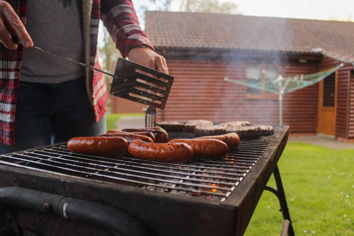 Backyard barbecue grill party in a garden
