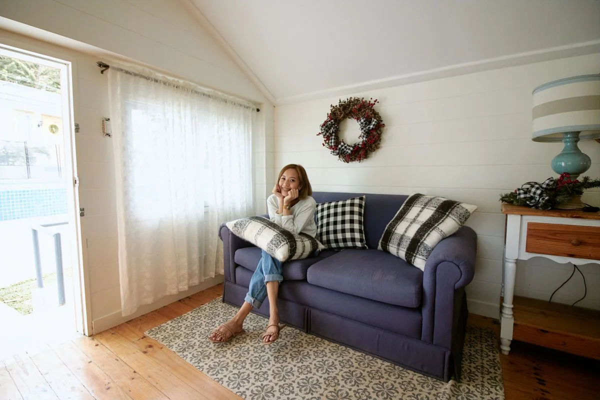 Buffalo check throw pillows on a farmhouse living room sofa