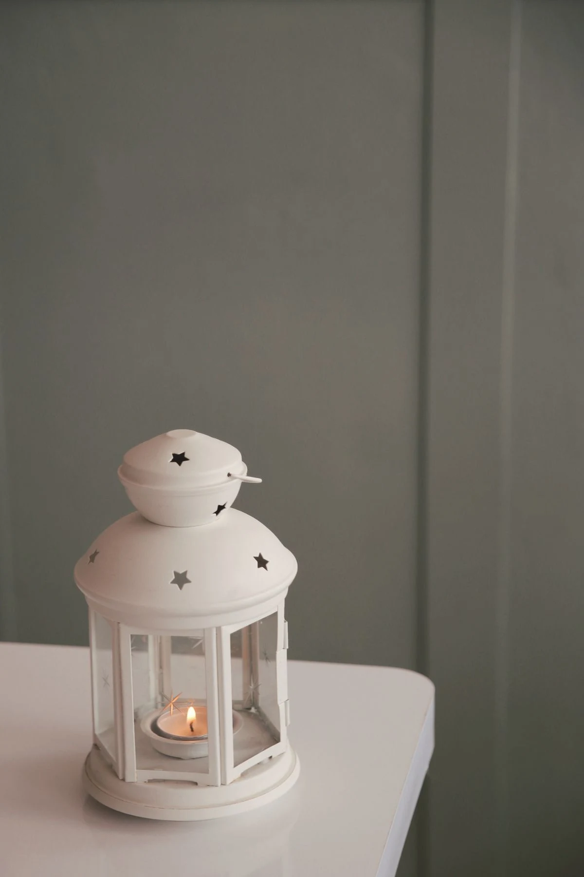 Candle lanterns glowing in a farmhouse living room