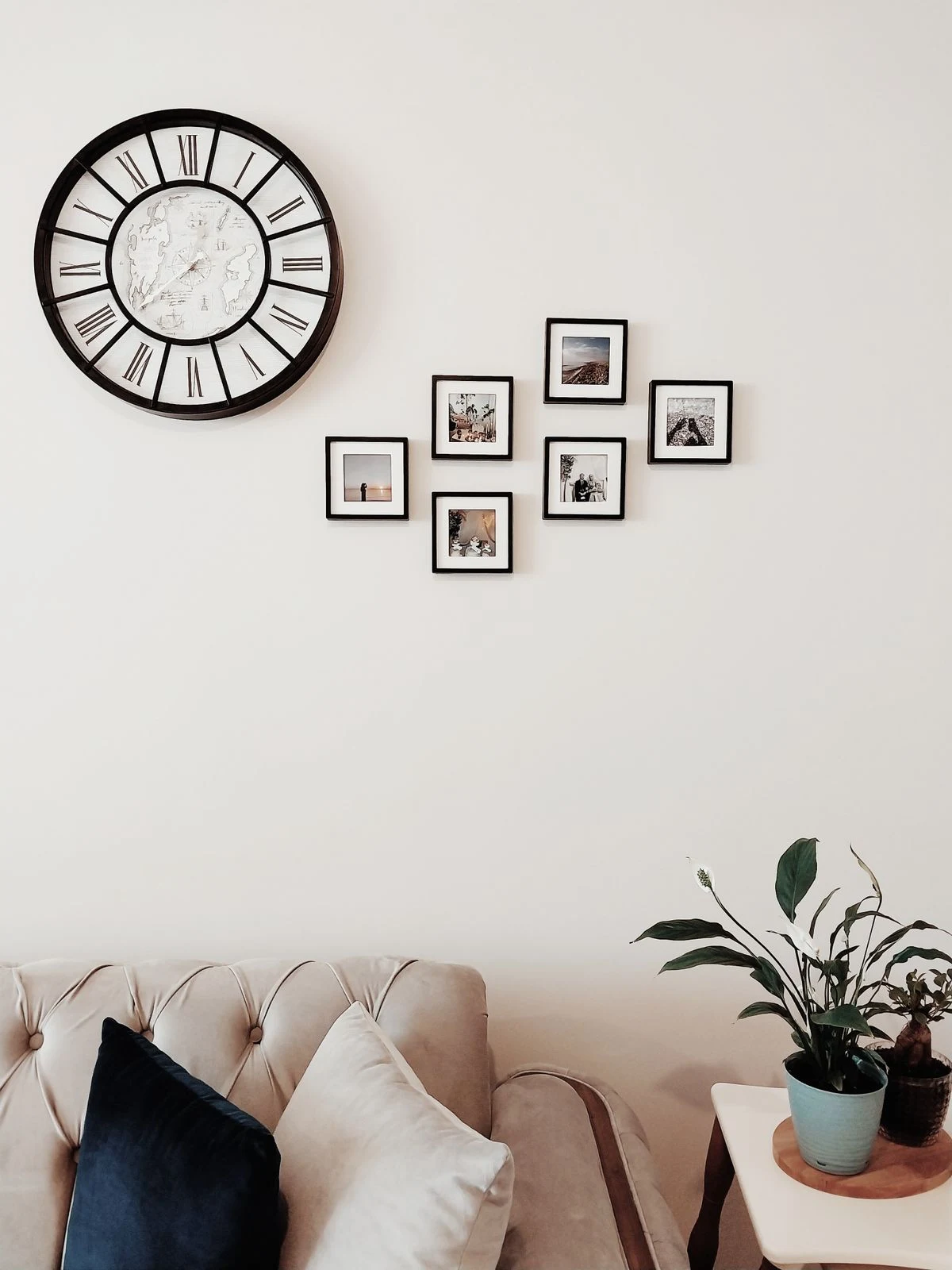 Farmhouse gallery wall with family photos in a living room