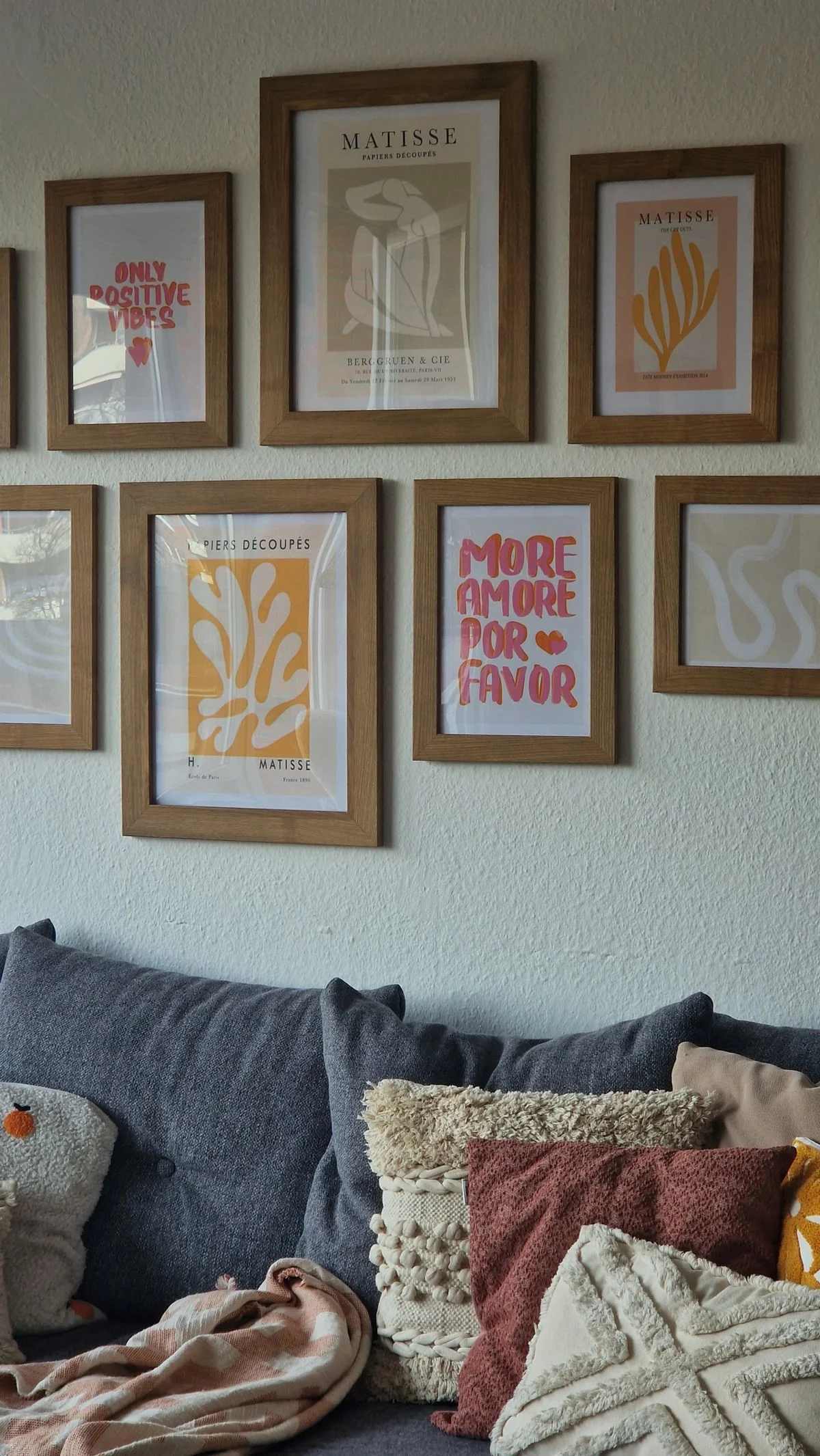 Gallery wall refreshed in a spring living room