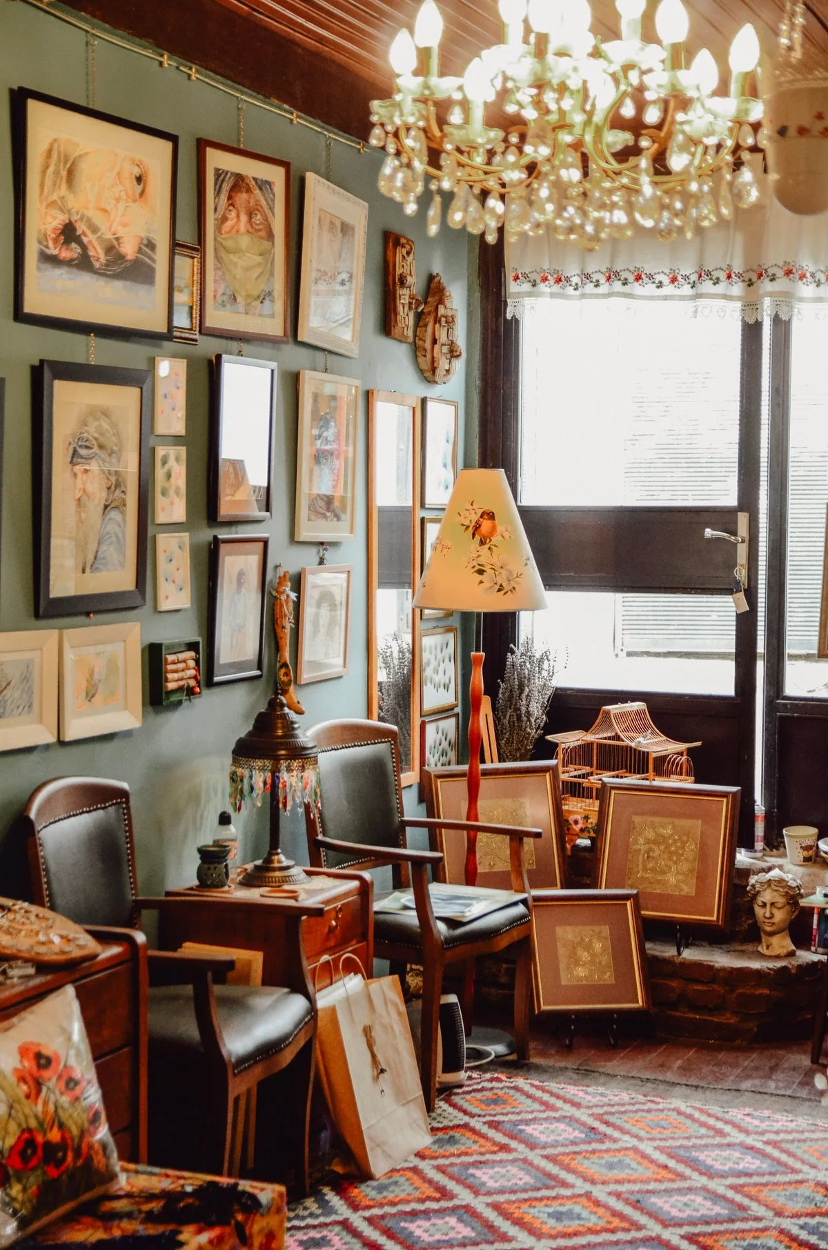 Boho gallery wall with mixed art in a living room
